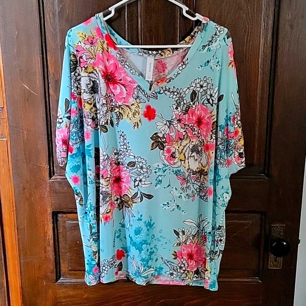Large floral dolman sleeve v neck top